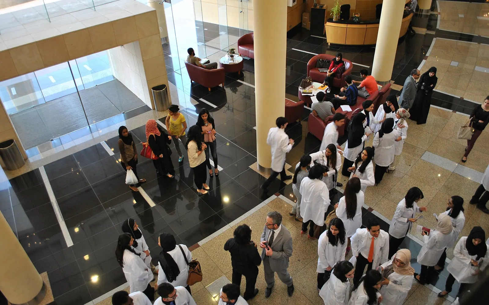 Students gather at White coat ceremony in the lobby