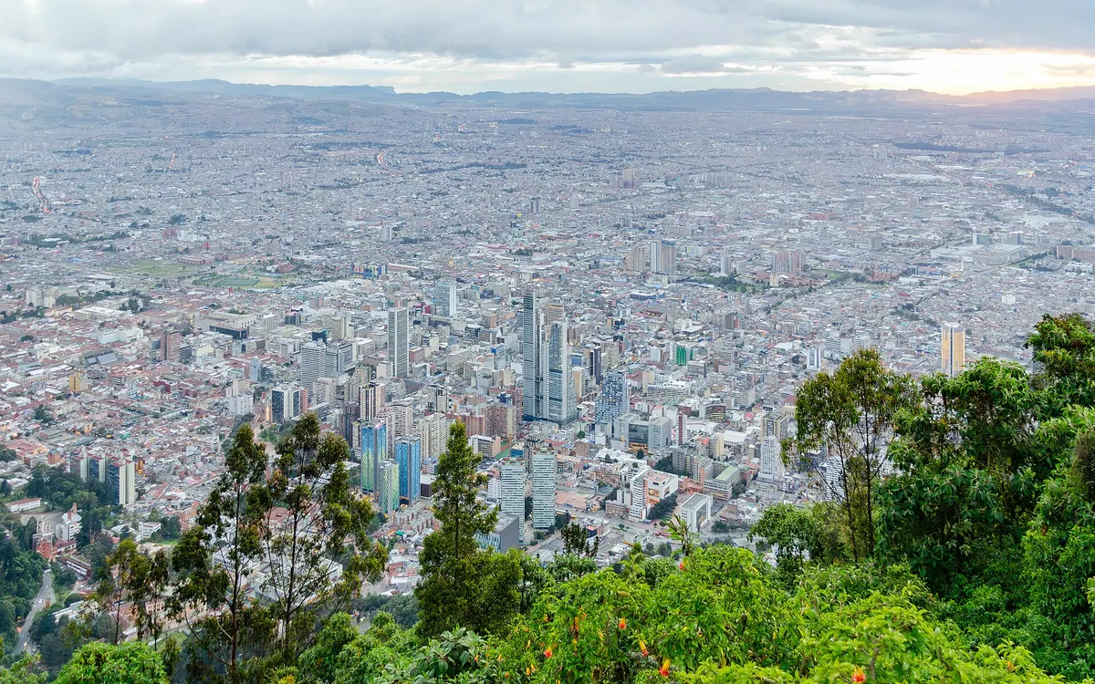 Evening view of the Colombian capital Bogotá from Mount Monserrate at sunset shortly after a rain shower.