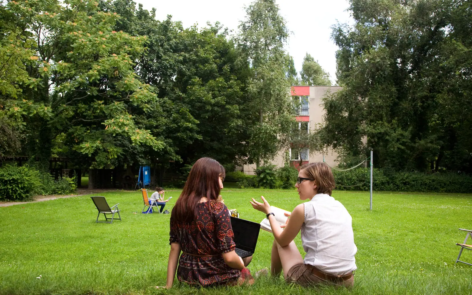 Students enjoy the lawns behind the ECLA of Bard dorms