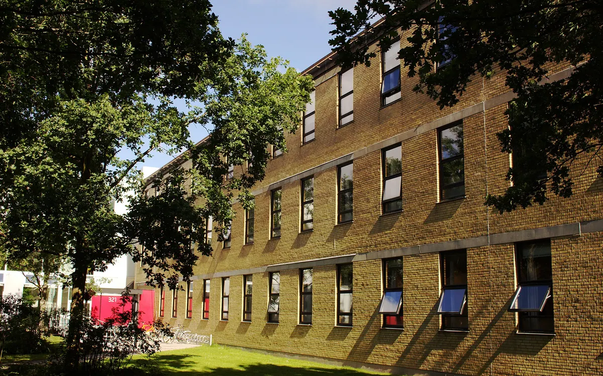 Building 321 at the Technical University of Denmark with building 324 in the background. Where part of DTU Compute resides.
