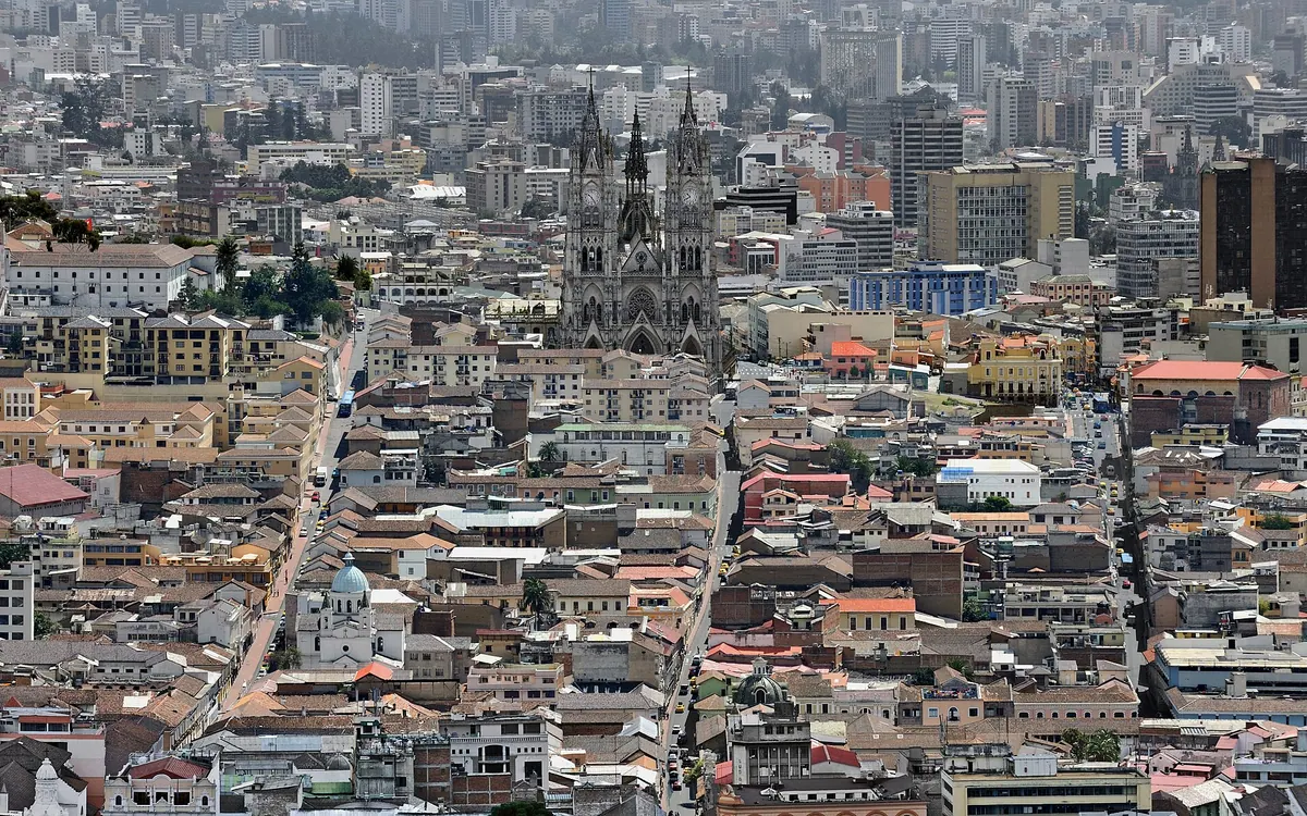 Quito, Ecuador: panoramic view of the historic centre of the city, as seen from El Panecillo (small piece of bread), with the basilica in the centre of the image.