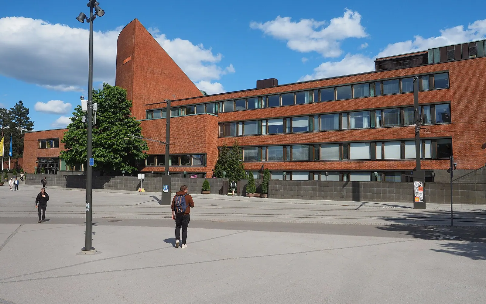 An exterior view of the Aalto University undergraduate centre (previously known as the main building of the Helsinki University of Technology) in Otaniemi, Espoo, Finland on a sunny afternoon in June 2023.