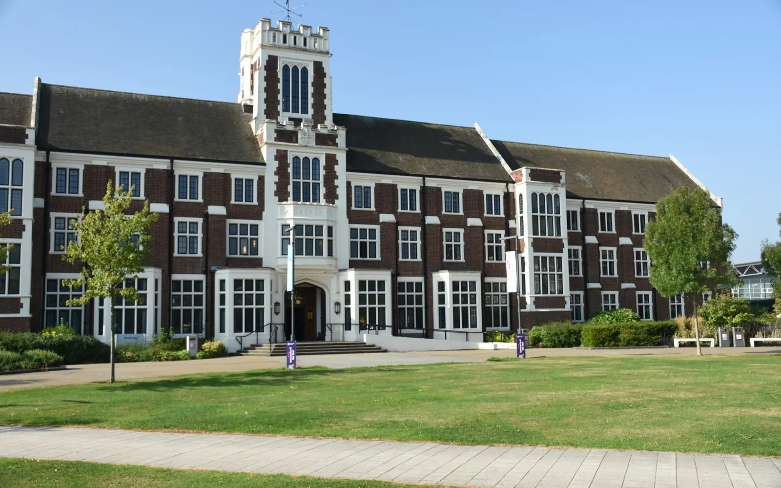 A photograph of the Loughborough University campus Hazlerigg Building in summer 2021