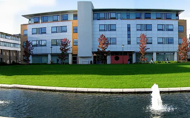 This shows three buildings on the University of Warwick campus; leftmost is the IMC (International Manufacturing Centre), middle is DCS (Department of Computer Science ) and rightmost is Maths and Statistics .