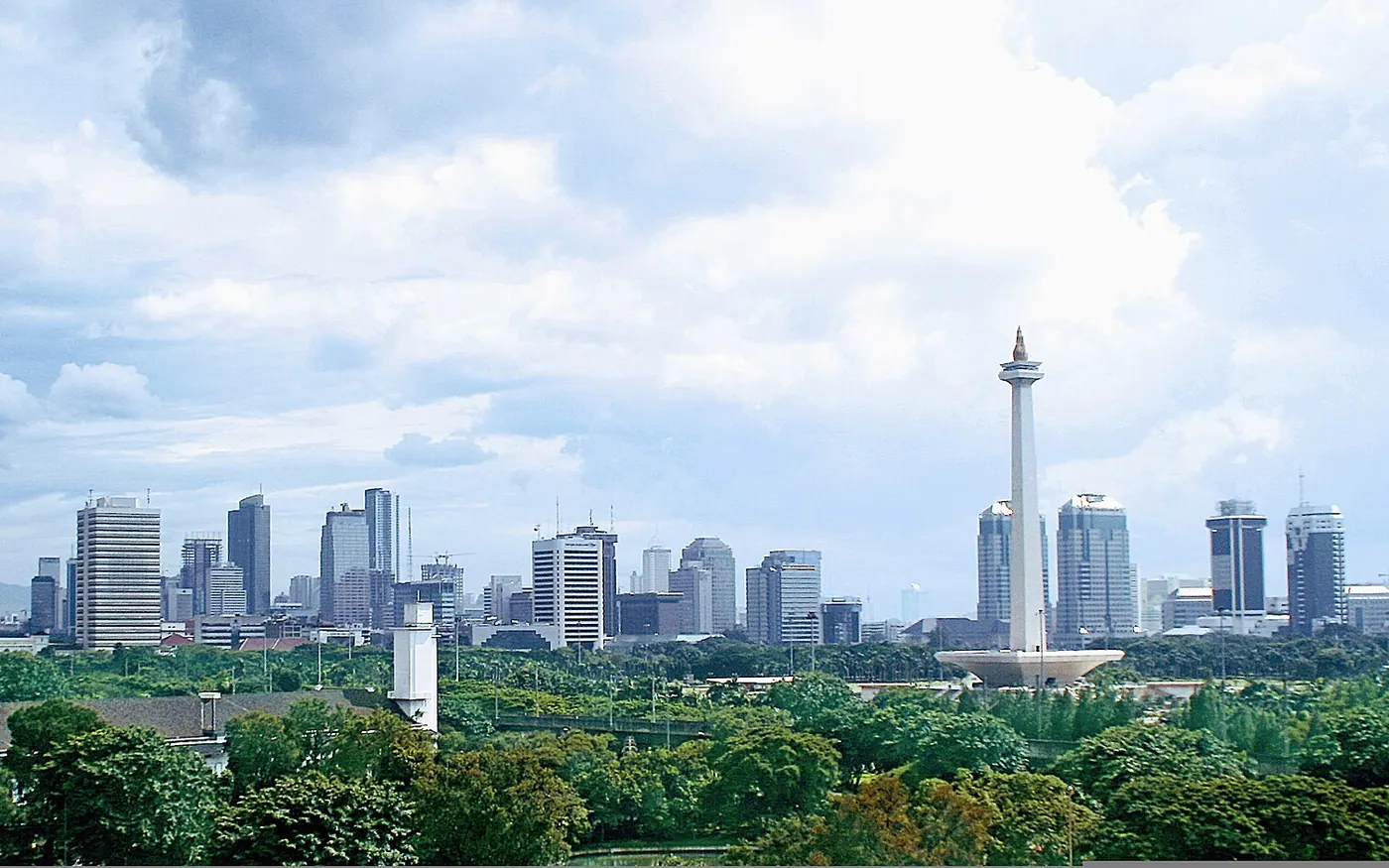 Jakarta, taken from Istiqlal mosque Jakarta panoramic view around Medan Merdeka (Merdeka square), the center of Jakarta and the nation. Monas (National Monument) on the foreground with rising Jakarta skylines on the back